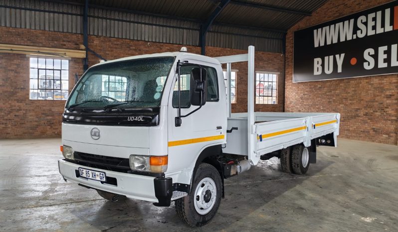 2014 NISSAN UD 40L DROPSIDE